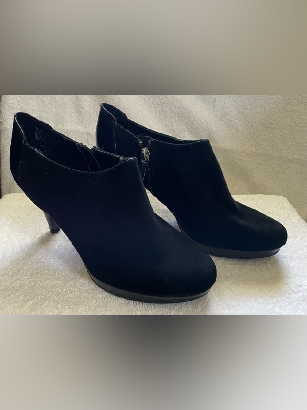 Bandolino black heeled booties, size 7.